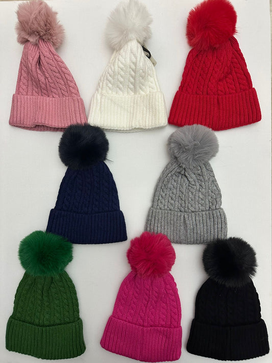 Cappello pon pon con trecce